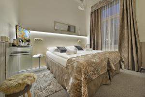 Postel nebo postele na pokoji v ubytování Anette Hotel + 37 fotografií