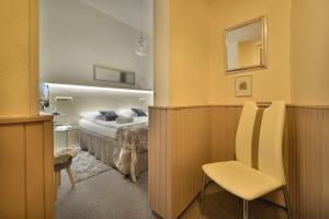 Postel nebo postele na pokoji v ubytování Anette Hotel