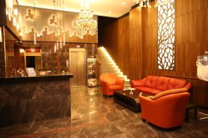 A seating area at Classes Hotel Airport