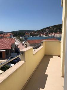 a balcony with a view of the water at studio apartment near the beach-Ilda Radonic in Jelsa