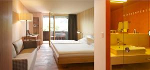 Cama o camas de una habitación en Krone Hittisau - Hotel & Restaurant im Bregenzerwald