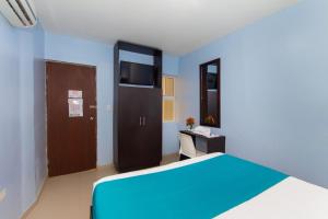 Postel nebo postele na pokoji v ubytování Azuán Suites Hotel By GEH Suites