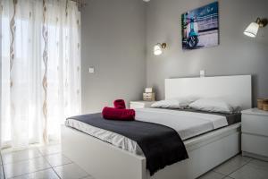 Postel nebo postele na pokoji v ubytování GP Luxury Apartment Preveza