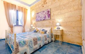 Posteľ alebo postele v izbe v ubytovaní Luxury Apartments - Torre San Giovanni