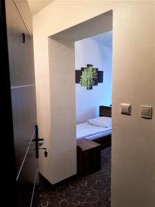 Posteľ alebo postele v izbe v ubytovaní Motel Orion Wolsztyn