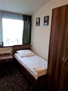 Posteľ alebo postele v izbe v ubytovaní Motel Orion Wolsztyn