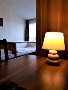 Posteľ alebo postele v izbe v ubytovaní Motel Orion Wolsztyn