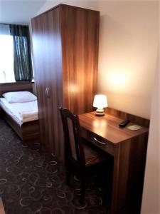 Posteľ alebo postele v izbe v ubytovaní Motel Orion Wolsztyn