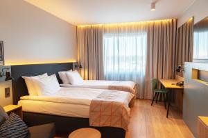 Postel nebo postele na pokoji v ubytování Holiday Inn Helsinki - Expo by IHG