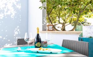 Nápoje v ubytovaní Luxury Apartments - Torre San Giovanni