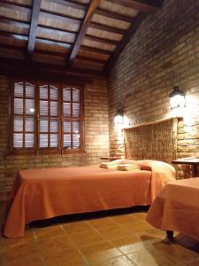 
A bed or beds in a room at Cabaña Duraznillo
