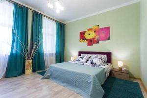 Postel nebo postele na pokoji v ubytování Apartments city center