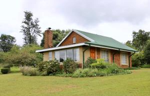 Κήπος έξω από το Lakeview Cottages