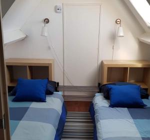 Ένα ή περισσότερα κρεβάτια σε δωμάτιο στο B&B Kleine Vliet