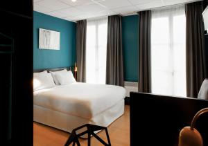 Postel nebo postele na pokoji v ubytování Hotel Daval