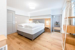 Letto o letti in una camera di Hotel Weissenstein