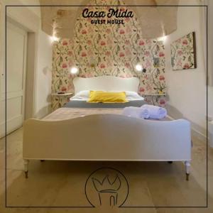 Postel nebo postele na pokoji v ubytování Casa Mida - Guest House