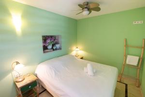 Voodi või voodid majutusasutuse Seaside Apartment Trupial toas