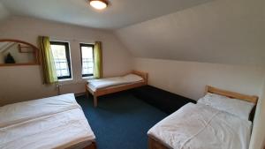 Posteľ alebo postele v izbe v ubytovaní Apartmány EDDY