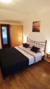 Кровать или кровати в номере Sunny day Rovinj