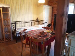 Postel nebo postele na pokoji v ubytování Senosios Gegužinės ūkis