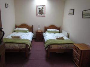 מיטה או מיטות בחדר ב-Prestwick Byre