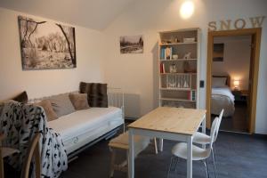 Posezení v ubytování L'Ancienne Poste - chambres d'hôtes et table de dégustation