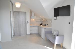 Kuchyňa alebo kuchynka v ubytovaní Willa Dobryłko II -Apartamenty