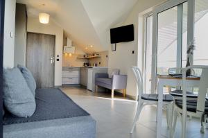 Kuchyňa alebo kuchynka v ubytovaní Willa Dobryłko II -Apartamenty