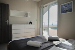 Posteľ alebo postele v izbe v ubytovaní Willa Dobryłko II -Apartamenty