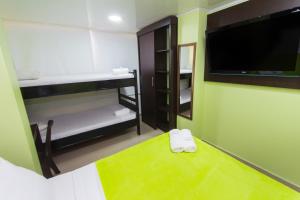 Postel nebo postele na pokoji v ubytování Hotel Marina Suites By GEH Suites