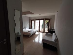 Postel nebo postele na pokoji v ubytování Hostal Gran Sol
