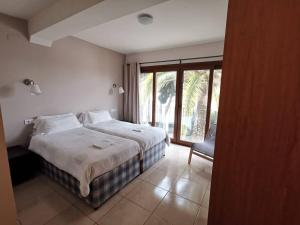 Postel nebo postele na pokoji v ubytování Hostal Gran Sol