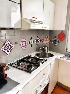 A kitchen or kitchenette at Sweet Home Panisperna