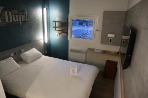 Postel nebo postele na pokoji v ubytování ibis Budget Le Treport Mers Les Bains