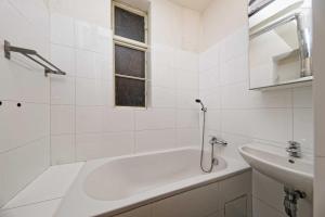 Ванная комната в Apartment Manesova 4