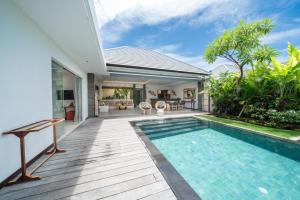 an external view of a villa with a swimming pool at Villa Bima - 3 Bedroom Villa in Seminyak in Seminyak