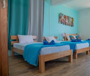 Postel nebo postele na pokoji v ubytování Villa Paradise Rodrigues