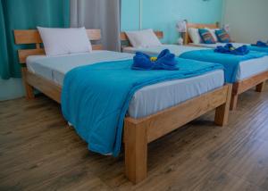 Postel nebo postele na pokoji v ubytování Villa Paradise Rodrigues