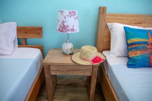 Postel nebo postele na pokoji v ubytování Villa Paradise Rodrigues