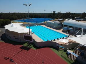 an overhead view of a large swimming pool at Gold Coast Performance Centre in Gold Coast