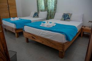Postel nebo postele na pokoji v ubytování Villa Paradise Rodrigues