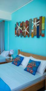 Postel nebo postele na pokoji v ubytování Villa Paradise Rodrigues