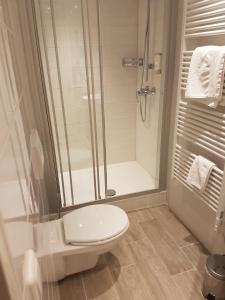 Koupelna v ubytování Posthotel Kolberbräu