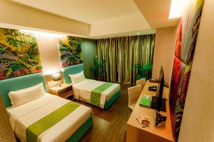 Postel nebo postele na pokoji v ubytování Aziza Paradise Hotel