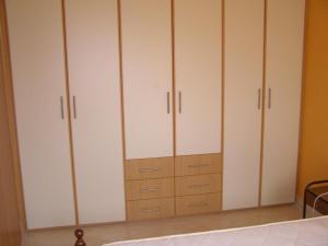 A bed or beds in a room at Dimitrios Apartments Még 37 kép