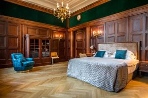Postel nebo postele na pokoji v ubytování Hotel Capital