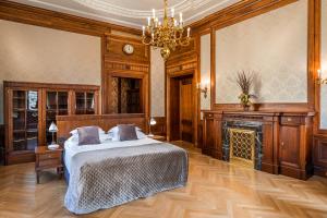 Postel nebo postele na pokoji v ubytování Hotel Capital