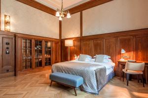 Postel nebo postele na pokoji v ubytování Hotel Capital