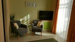 Telewizja i/lub zestaw kina domowego w obiekcie Hotel Hotwagner